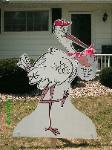 female stork sign in yard